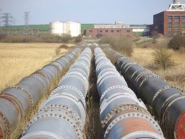 Pipes for cooling systems shown outdoors.
